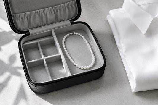 Pearl necklace stored in a black travel organizer