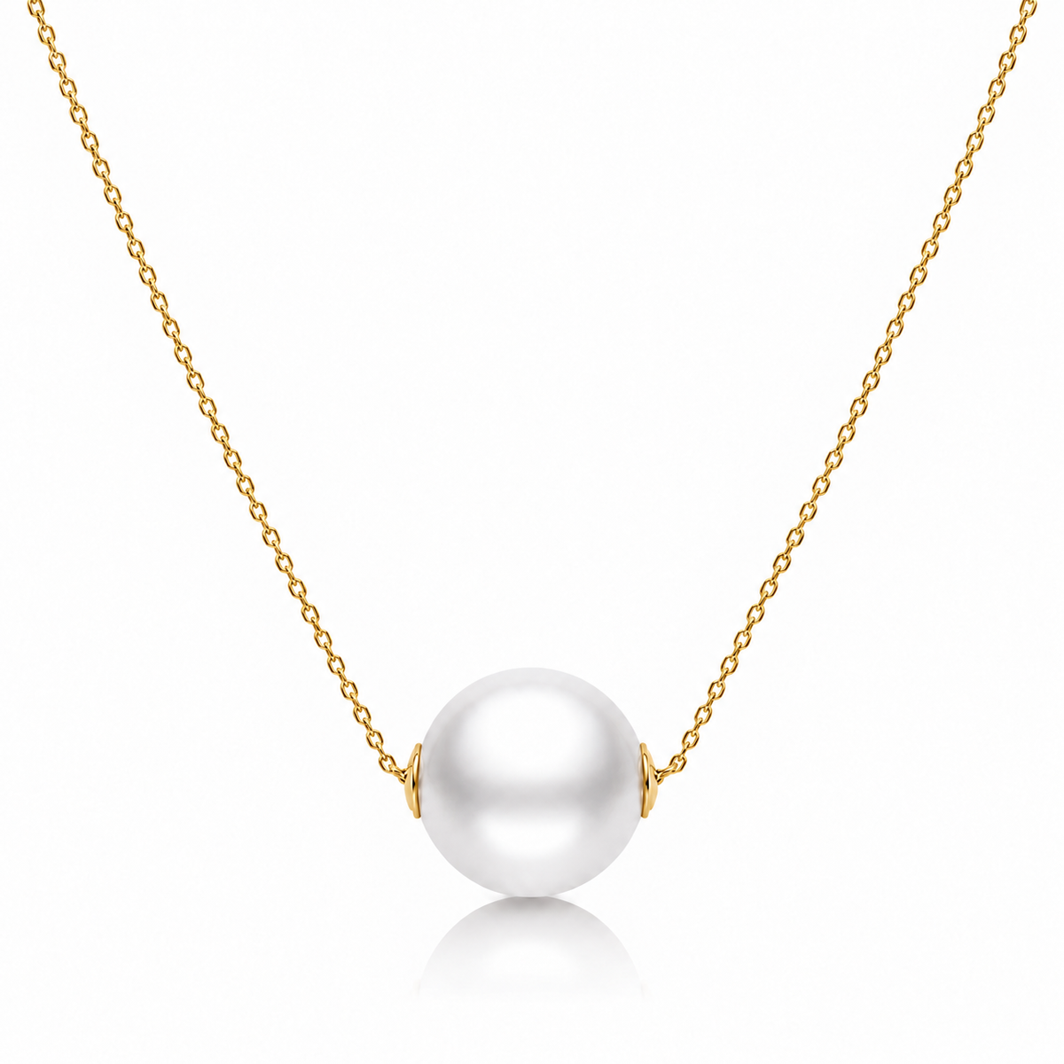 Gold freshwater pearl bead necklace with a single round white pearl on a white background