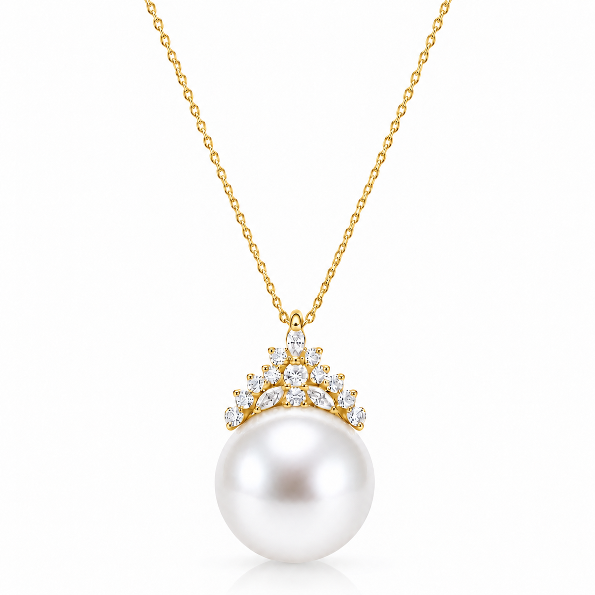 Gold freshwater pearl crown pendant necklace with clear accent stones on a white background