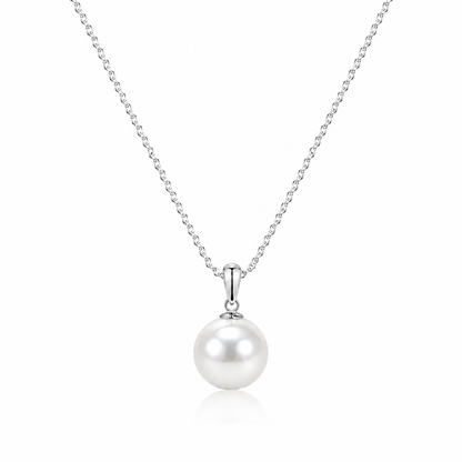 White freshwater pearl pendant necklace with a polished silver-tone bail and fine chain on a white background.