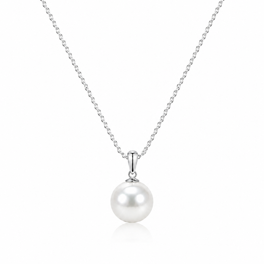 White freshwater pearl pendant necklace with a polished silver-tone bail and fine chain on a white background.