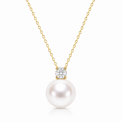Gold-tone colour reference of a freshwater pearl solitaire necklace with a clear cubic zirconia on a white background.