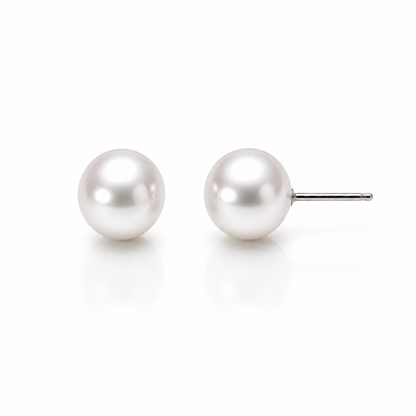 Freshwater pearl stud earrings on a white background