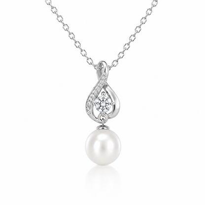 Starlit Drop freshwater pearl pendant necklace with intertwined sterling silver curves and cubic zirconia accents on a white background.