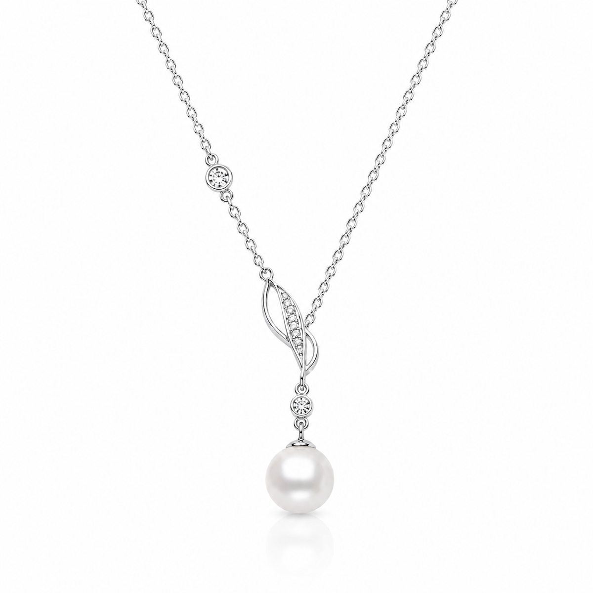 Willow Dew freshwater pearl pendant necklace in sterling silver with a leaf motif and cubic zirconia accents on a white background.