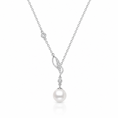 Willow Dew freshwater pearl pendant necklace in sterling silver with a leaf motif and cubic zirconia accents on a white background.