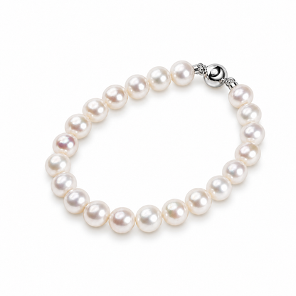 PERLAVELLE PL3 round freshwater pearl bracelet with S925 silver yuanbao clasp, diagonal view on a white background